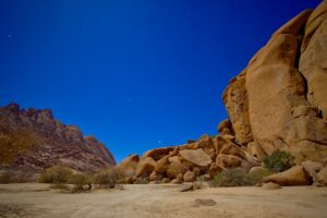 Star-filled night sky above granite boulders at Spitzkoppe