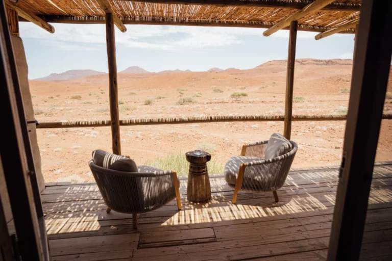 Chairs on a Damaraland Camp veranda overlooking the plains