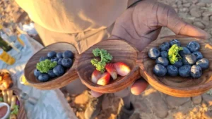 Fruit and snacks in wooden bowls during a Grootberg outing