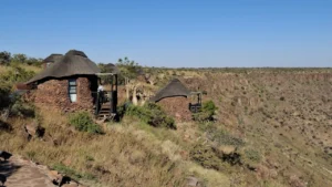 Stone chalet overlooking the landscape at Grootberg Lodge