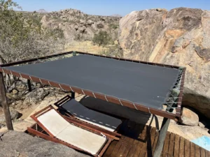 Shaded viewing deck above the rocks at Hoada Campsite