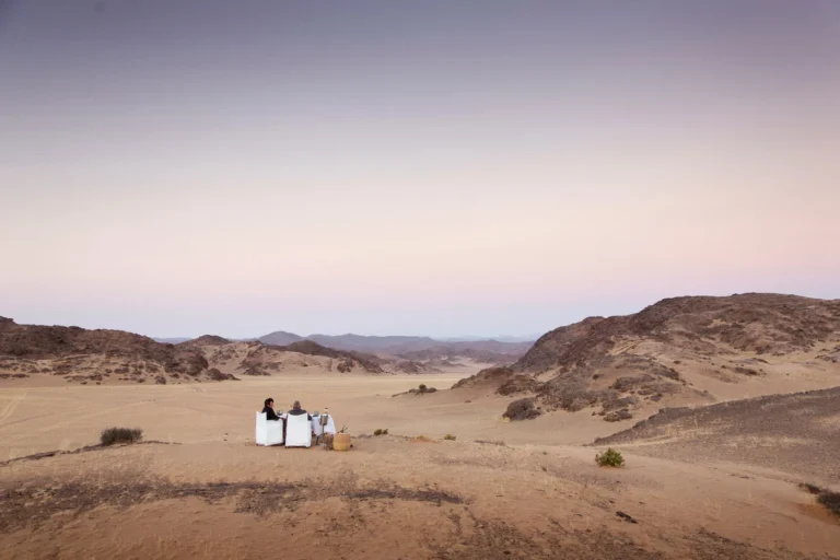Private dining setup in the desert near Hoanib Skeleton Coast Camp