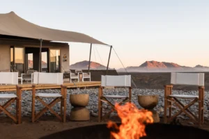 Fire pit beside the main deck at Kulala Desert Lodge
