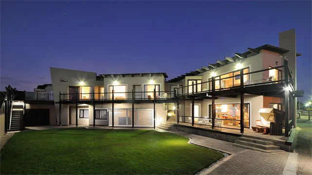 Guesthouse courtyard and balconies at night