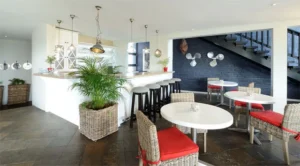 Lounge and bar seating at Oyster Box Guesthouse